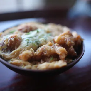 It's like Oyakodon (chiken &amp; eg over rice)  but with chicken karaage (fried chicken)
