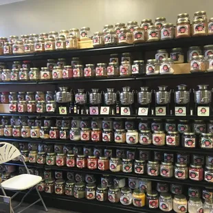 a large display of jars of food