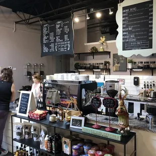  a woman standing in front of the counter