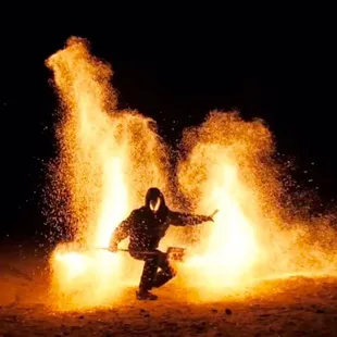 Performance for a hang drum music video. The charcoal staff.