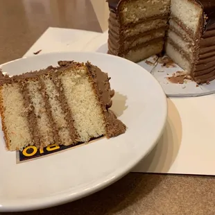 4 layer vanilla cake with  milk chocolate frosting!!