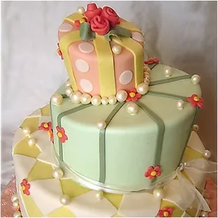 a cake with a gift on top