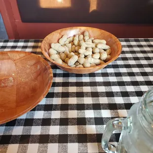 Peanuts!! Allergy affected diners please make note of this!  The restaurant is extremely clean though. No shells on the floor.