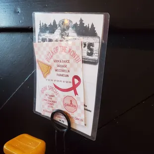 Pizza of the month and drink special and table set up