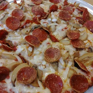 Pepperoni, mushroom, onion pizza