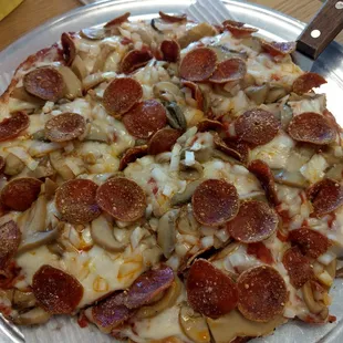 Small pepperoni, mushroom, onion with extra sauce.