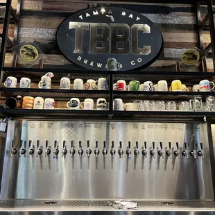 beer taps on a shelf