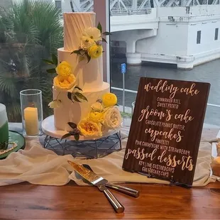 wedding cake and cupcakes