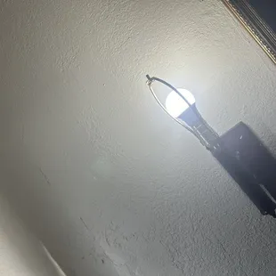 No lampshade on the one lamp that had a lightbulb