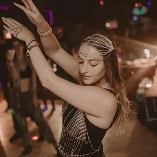 a woman dancing at a party