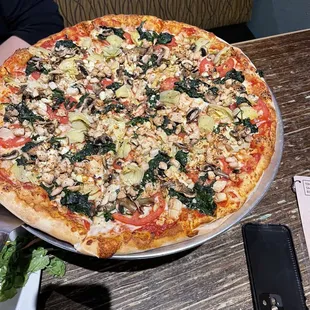 Choose your own EX large. Chicken, spinach, feta, artichoke, mushrooms, Roma tomatoes. Hand tossed, classic sauce