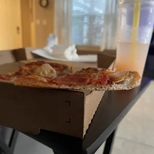 Pizza is super thin... hand tossed