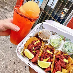 Quesa tacos with Al Pastor and Chamoynito's strawberry limeade agua fresca!! Bomb!