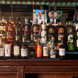 a bar full of liquor bottles
