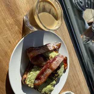 bacon and avocado toast on a plate