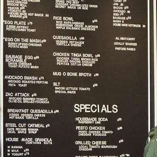 a menu on a blackboard in a restaurant