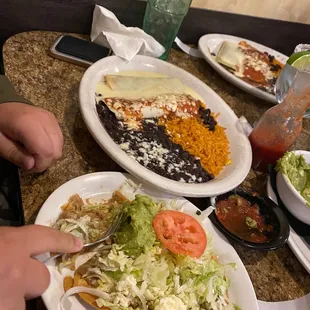 Vegetarian tostada and bean burrito I believe?