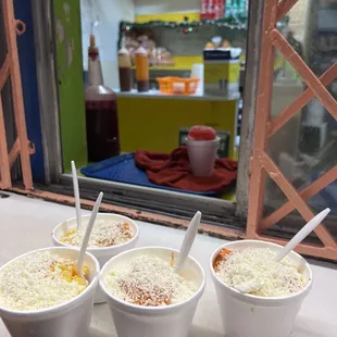 Elotes...and more not pictured like frito pie, champurrado, and strawberry raspas with crema