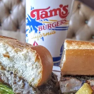 Tams Burger Yucaipa,California  A huge steak,on french bagutte,huge dinner salad,french fries-WOW!