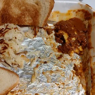Chili and Cheese omelette with hash browns, finished it very fast.