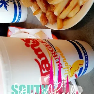 Popcorn shrimp, fries and onion rings