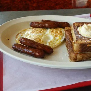 French Toast with 3 eggs and 4 sausages delicious