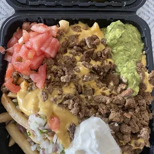 Carne asada fries. BIG enough to share. Delicious. $12.92