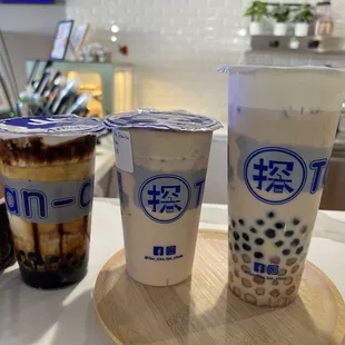 two cups of bubble tea on a table