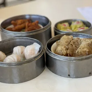 Shrimp bonnets a little dry, but adequate. I would pass on the siu mai, dryish. Tofu skins quite delicious! Chicken feet very good.