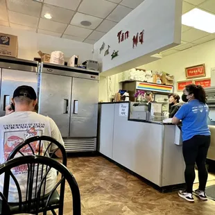 a man and a woman in a restaurant