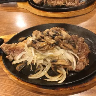 Sizzling Rib Steak with Mushroom and Onion