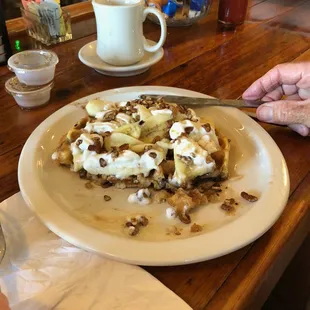 Delicious Belgian Waffle with pecans and bananas.  Oh, and whipped cream :)