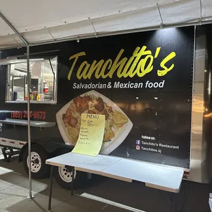 a table with a sign on it