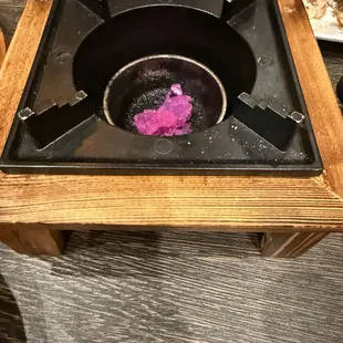 Small fire pit to keep food hot.