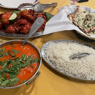 Tandoori Chicken, Chicken Makhni (butter chicken), plain rice, Garlic Naan