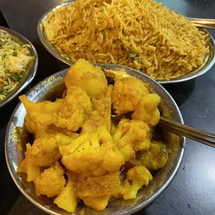 Chicken Biryani (Top). Aloo Gobhi (Bottom).