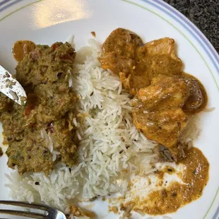 Plate with eggplant on left and chicken and kebab from mixed grill on right