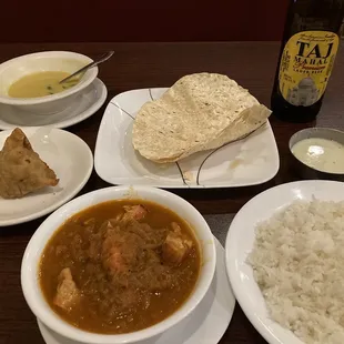 Chicken tikka masala, mulligatawny, vegetable samosa, papadum, chutney, and Taj Mahal beer.