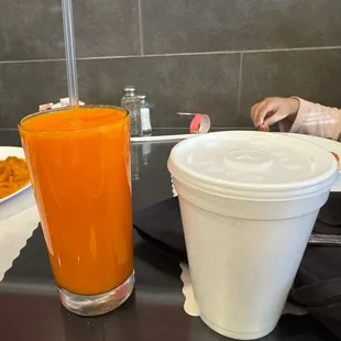 The mango lassi was a deep orange but still tasted great!