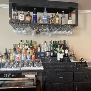 a bar with liquor bottles