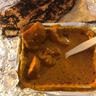 Three pieces of chicken and the rest were peppers and onions.