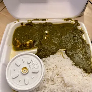 Palak paneer comes with white rice and side of lentils, nice hearty chunks of Indian cheese cubes