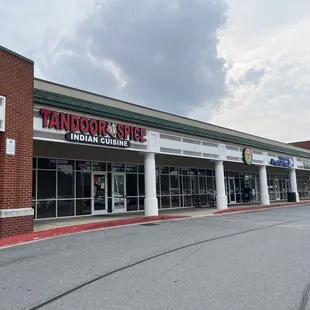 Front of restaurant in shopping complex.