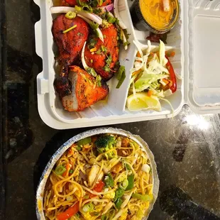a meal in a styrofoam container