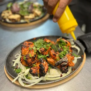 a plate of food being prepared