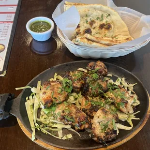 Tandoori malai chicken tikka with garlic naan