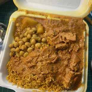 Chicken Tikka Masala, chickpeas, potatoes, and rice