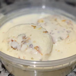 Rasmalai. Creamy and milky syrup with chhena (&quot;cottage cheese&quot;) balls. Syrup ingredients: milk, sugar, cream, and saffron. $4.