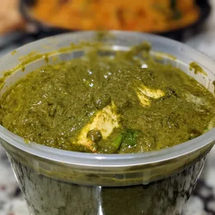 Palak paneer. Spinach cooked with fresh homemade cheese. $13.