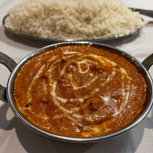 Butter Chicken - Tender boneless pieces of chicken cooked In fresh tomato sauce with a light touch of cream and imported seasonings.